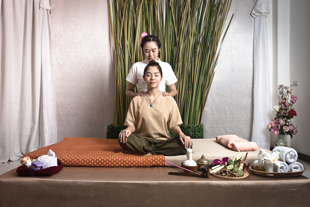 hands of massage therapist massaging back of leg - Pan Thai Massage - Sugar Lang, TX